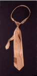 Il nodo alla cravatta legno scolpito